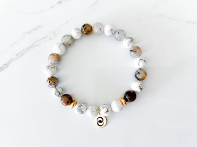 Healing crystal bracelet for positive thinking and manifestation with lodolite and howlite.